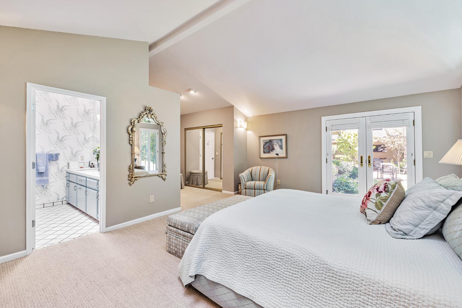 1625 Gary Way Carmichael, CA 95608 - Photo 13 of 49 a bedroom with a bed and a large window