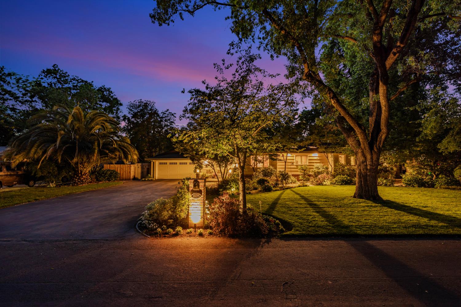 1625 Gary Way Carmichael, CA 95608 - Photo 33 of 49 a view of a yard with cars parked in front of house