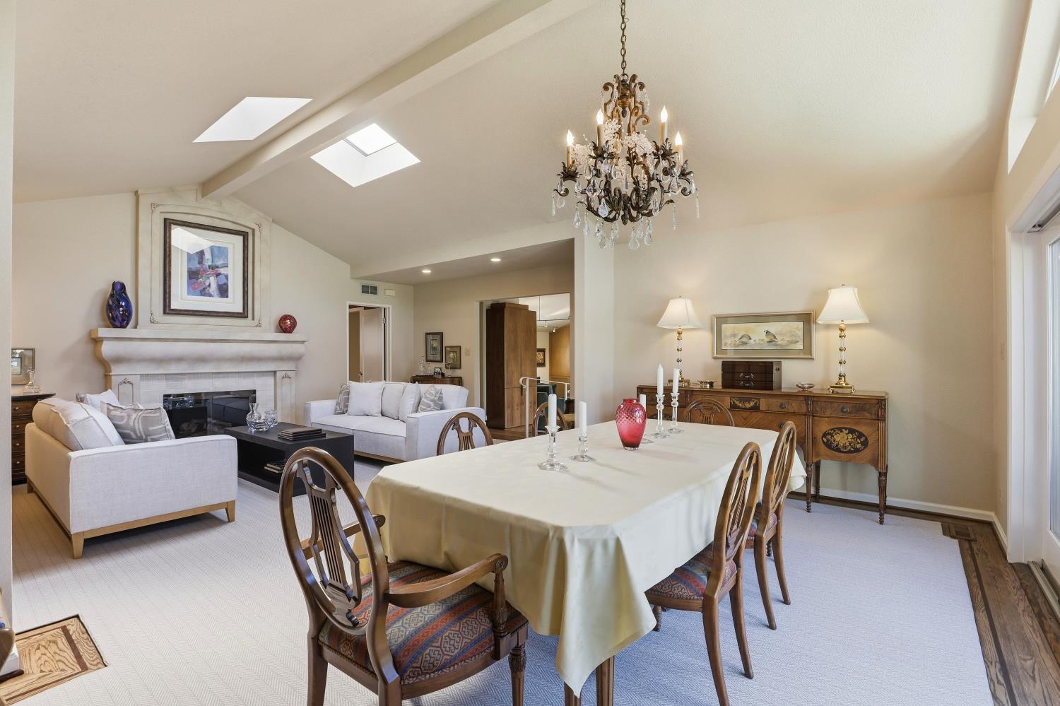 1625 Gary Way Carmichael, CA 95608 - Photo 36 of 49 a view of a dining room with furniture wooden floor and chandelier