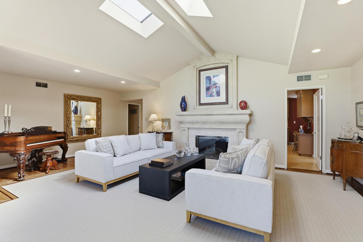 1625 Gary Way Carmichael, CA 95608 - Photo 39 of 49 a living room with furniture and a fireplace