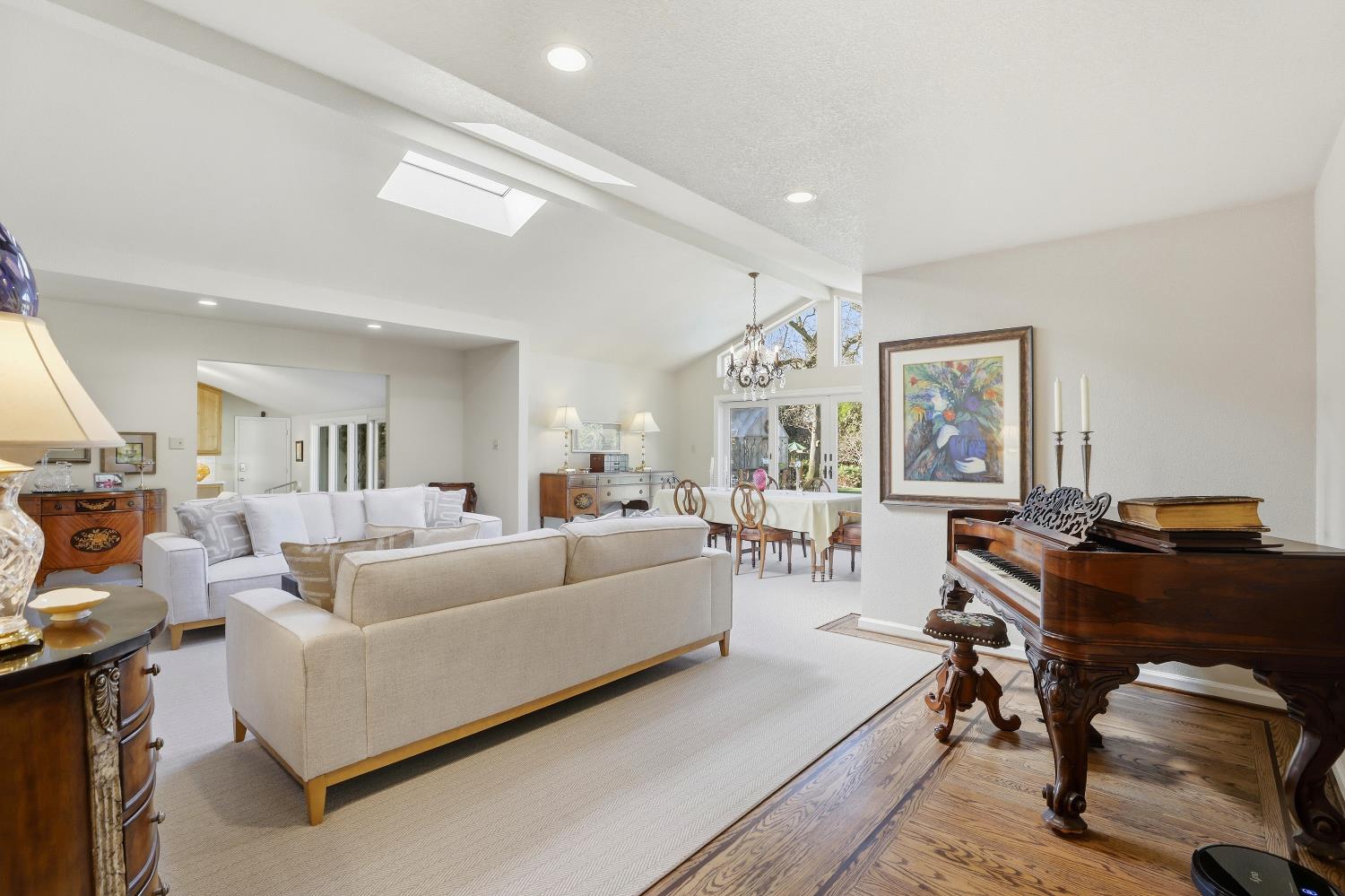 1625 Gary Way Carmichael, CA 95608 - Photo 41 of 49 a living room with furniture and a piano