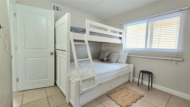 a view of a bedroom with a window