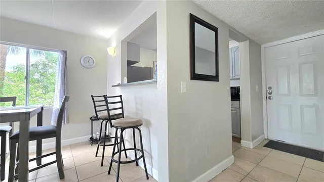 a view of a livingroom with furniture and window