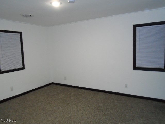 10971 Auburn Road Chardon, OH 44024 - Photo 25 of 40 Unfurnished room featuring dark colored carpet and ornamental molding