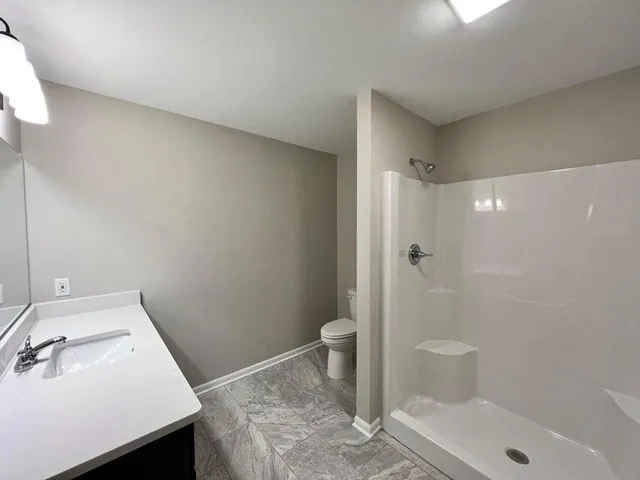 a bathroom with a sink and a toilet