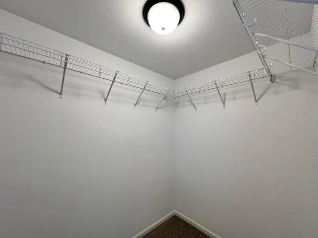 a view of a room with racks on the wall