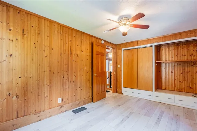 a view of a livingroom with wooden floor