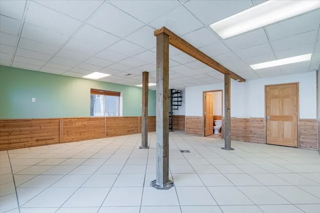 a view of livingroom with an empty room