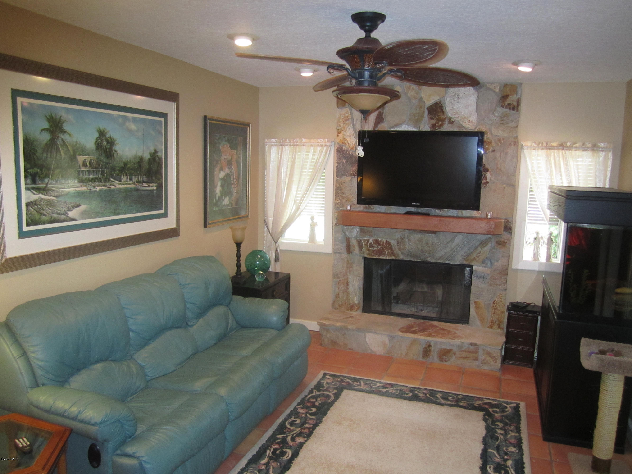 1024 Knecht Road Northeast Palm Bay, FL 32905 - Photo 7 of 20 Family Room with Fireplace