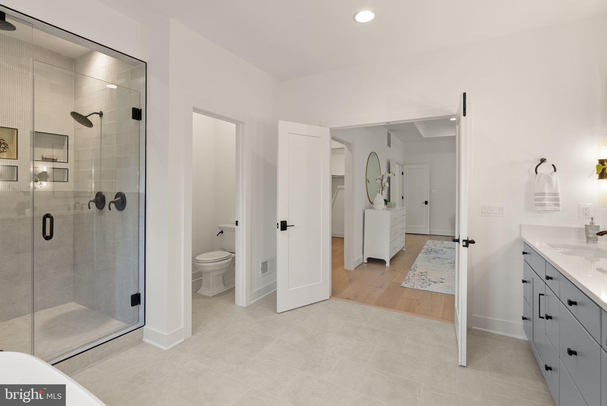 7215 Barnett Road Bethesda, MD 20817 - Photo 25 of 39 a bathroom with a shower and a sink