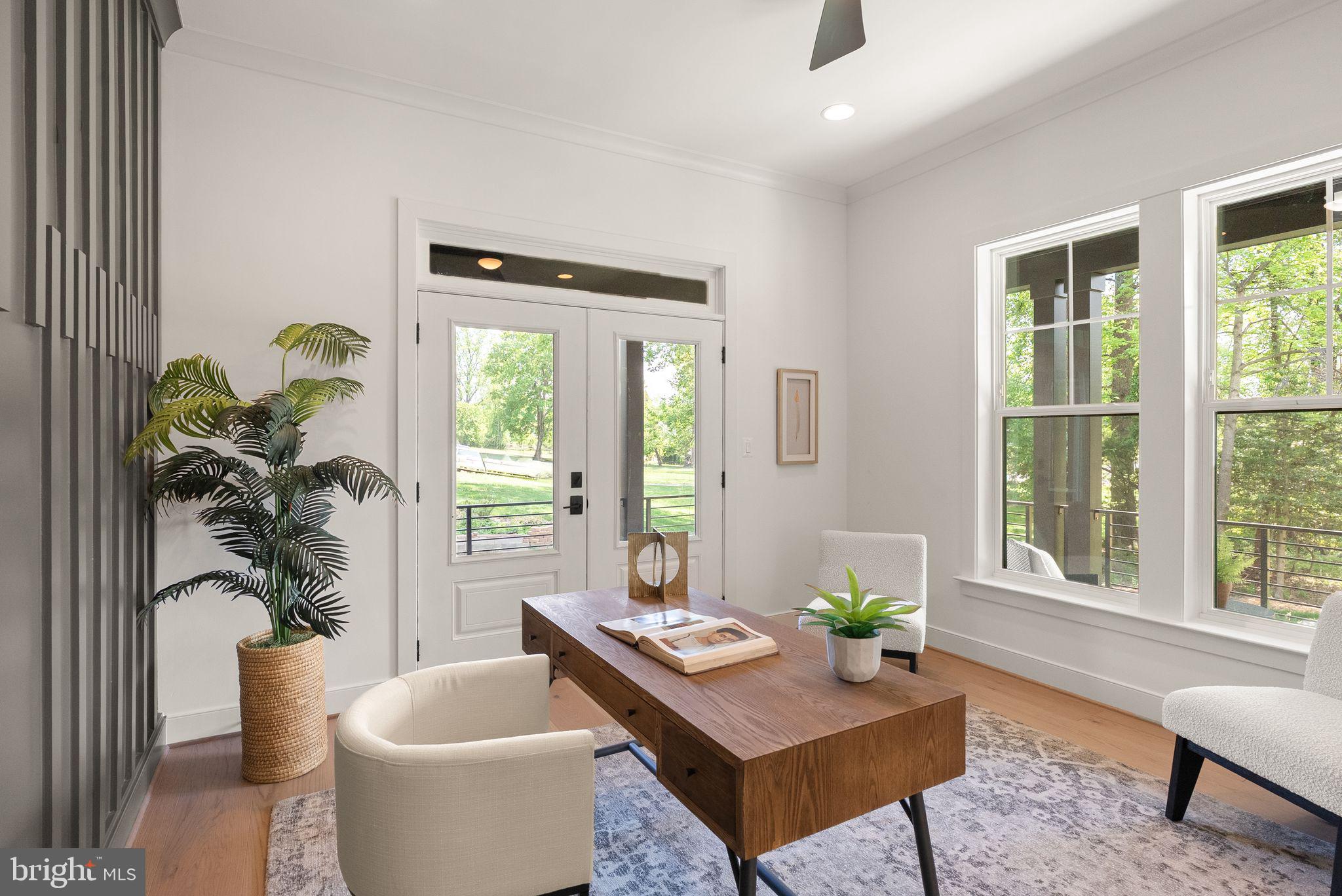 7215 Barnett Road Bethesda, MD 20817 - Photo 3 of 39 a living room with furniture and a potted plant