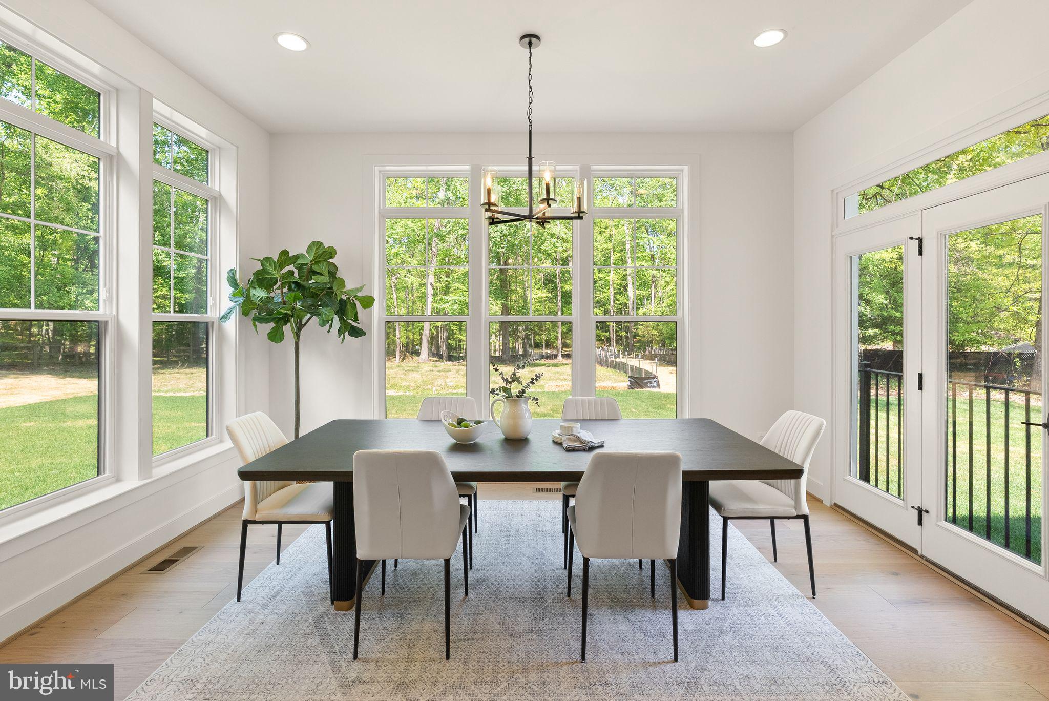 7215 Barnett Road Bethesda, MD 20817 - Photo 9 of 39 a view of a dining room with furniture window and outside view