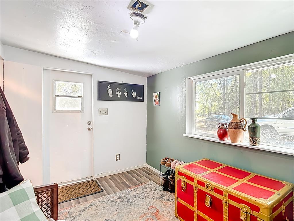 6421 Sunnyside Ranch Road Brooksville, FL 34602 - Photo 11 of 49 a bedroom with a bed and a window