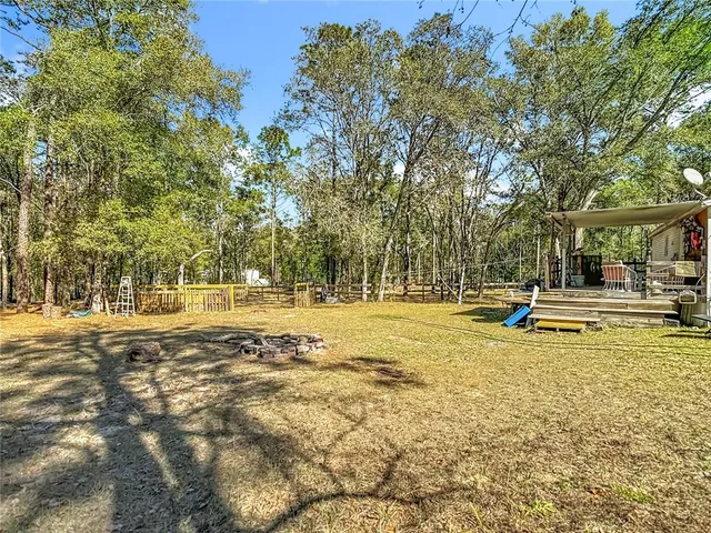 a view of a swimming pool with an outdoor space