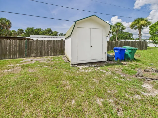 an aerial view of a house having yard
