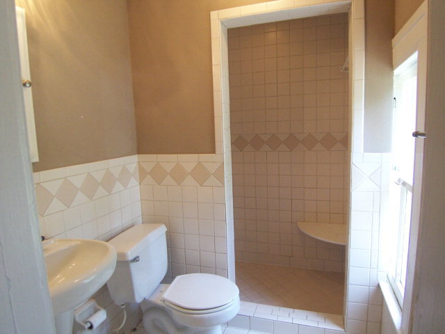 5500 Sardis Church Road Macon, GA 31216 - Photo 5 of 10 a bathroom with a toilet and shower