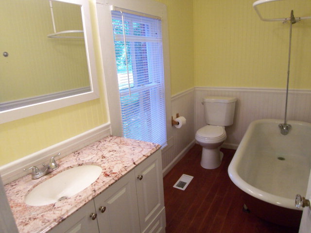 5500 Sardis Church Road Macon, GA 31216 - Photo 6 of 10 a bathroom with a sink and a mirror