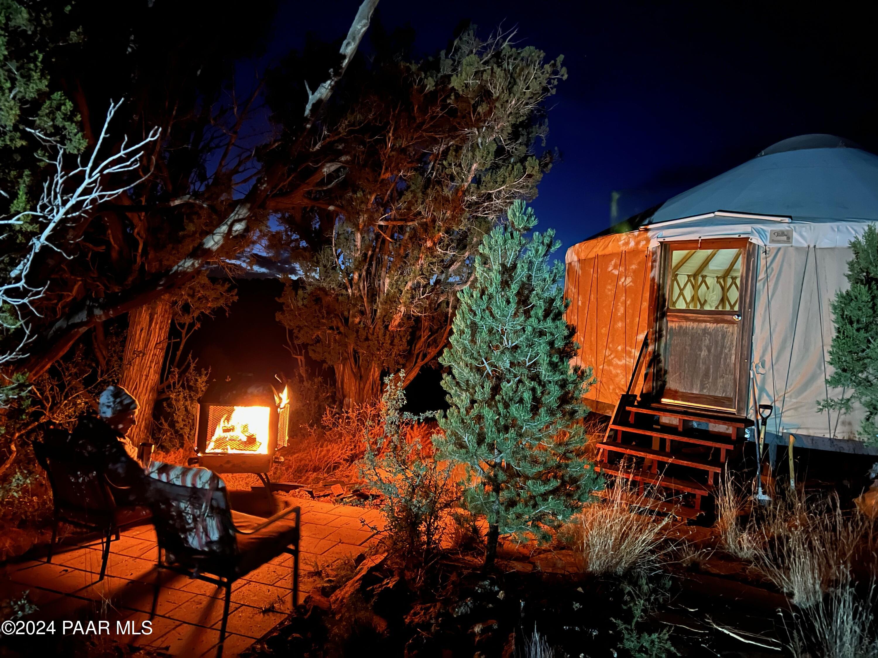 0 Wooden Ear Ranch Road Seligman, AZ 86337 - Photo 1 of 47 a backyard of a house with table and chairs