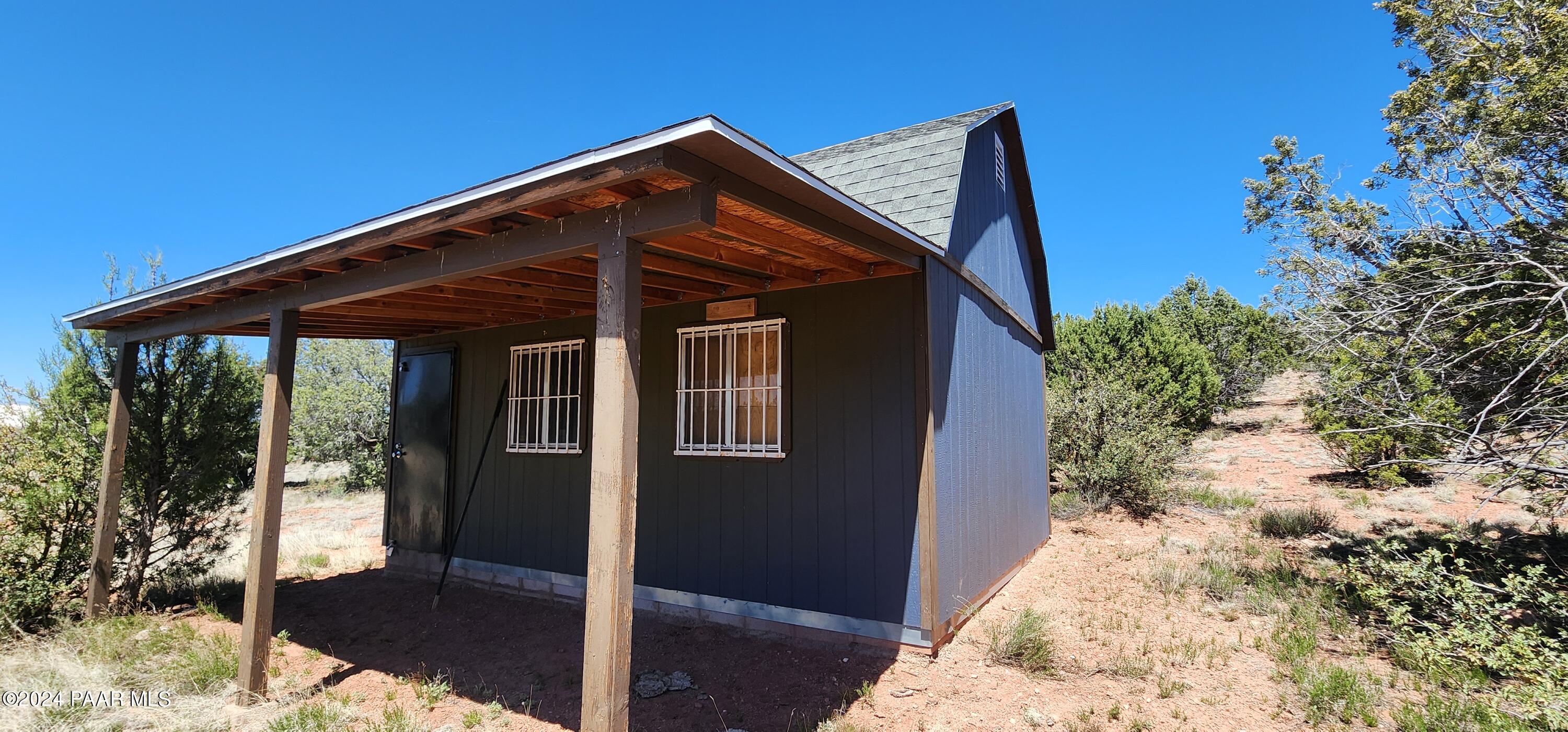 0 Wooden Ear Ranch Road Seligman, AZ 86337 - Photo 14 of 47 a front view of a house