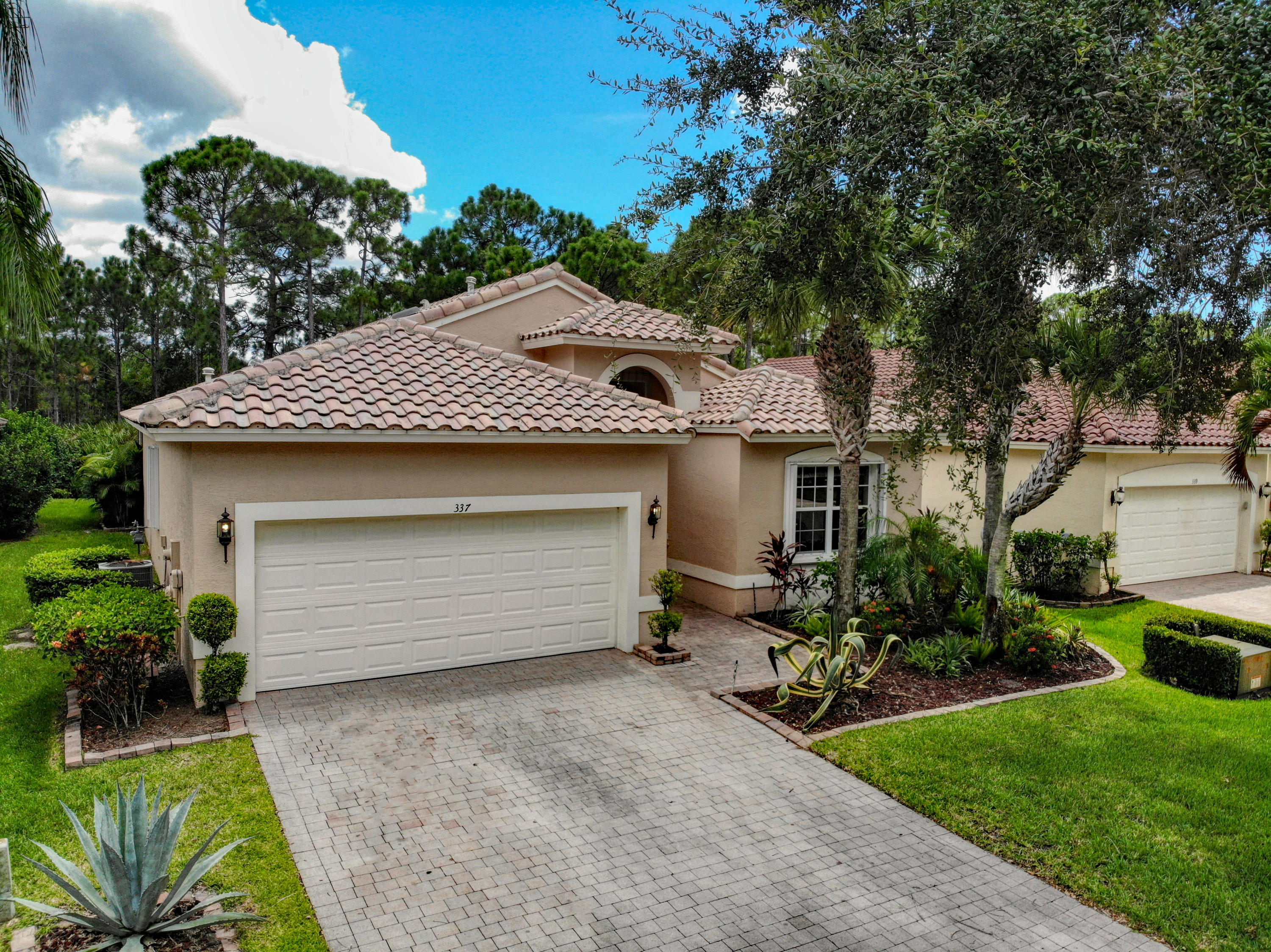 337 Springview Loop Port St. Lucie, FL 34986 - Photo 6 of 48 Front Quarter Low