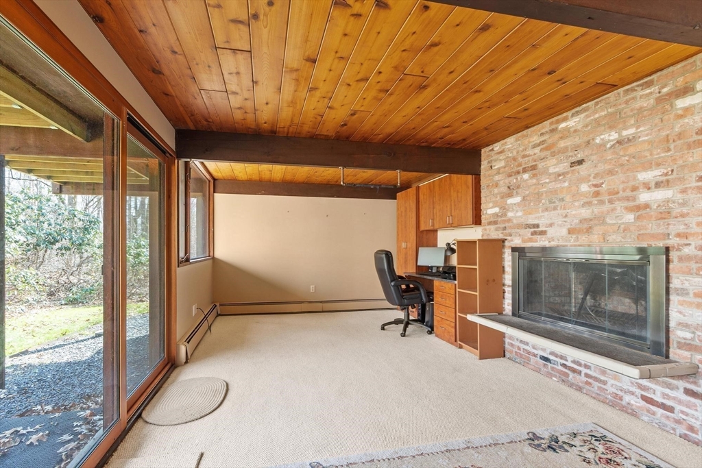 21 Gray Road Andover, MA 01810 - Photo 21 of 38 a room with a large window and furniture