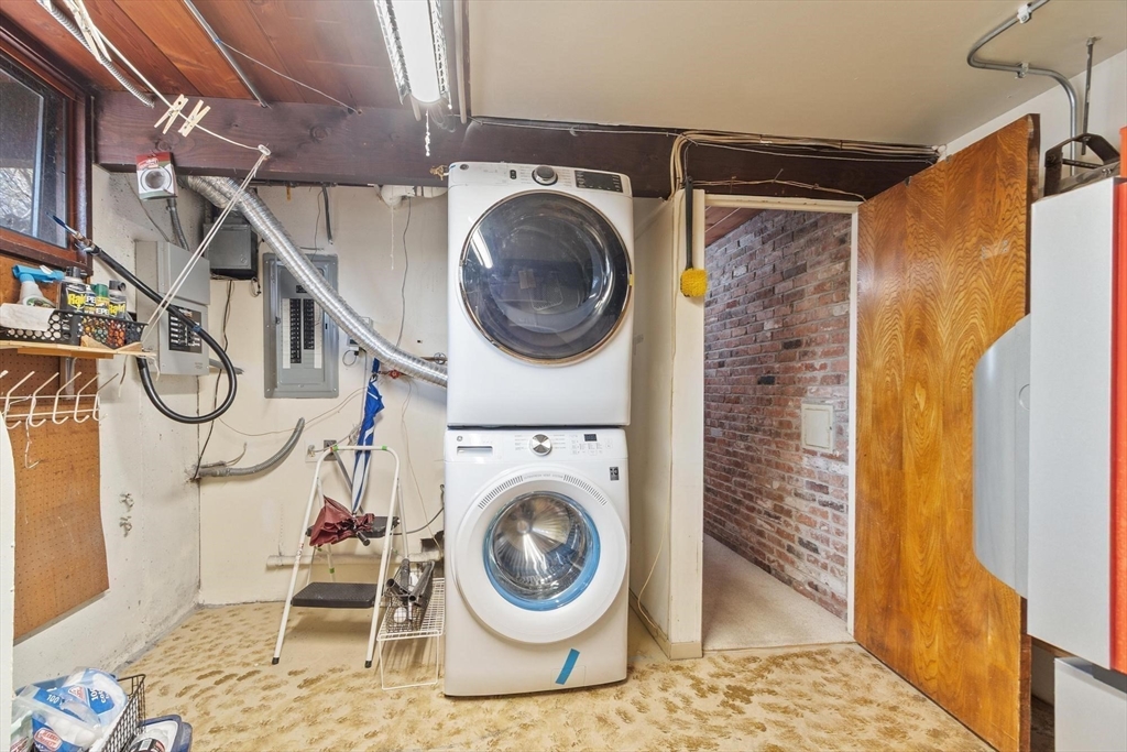 21 Gray Road Andover, MA 01810 - Photo 26 of 38 a utility room with dryer and washer