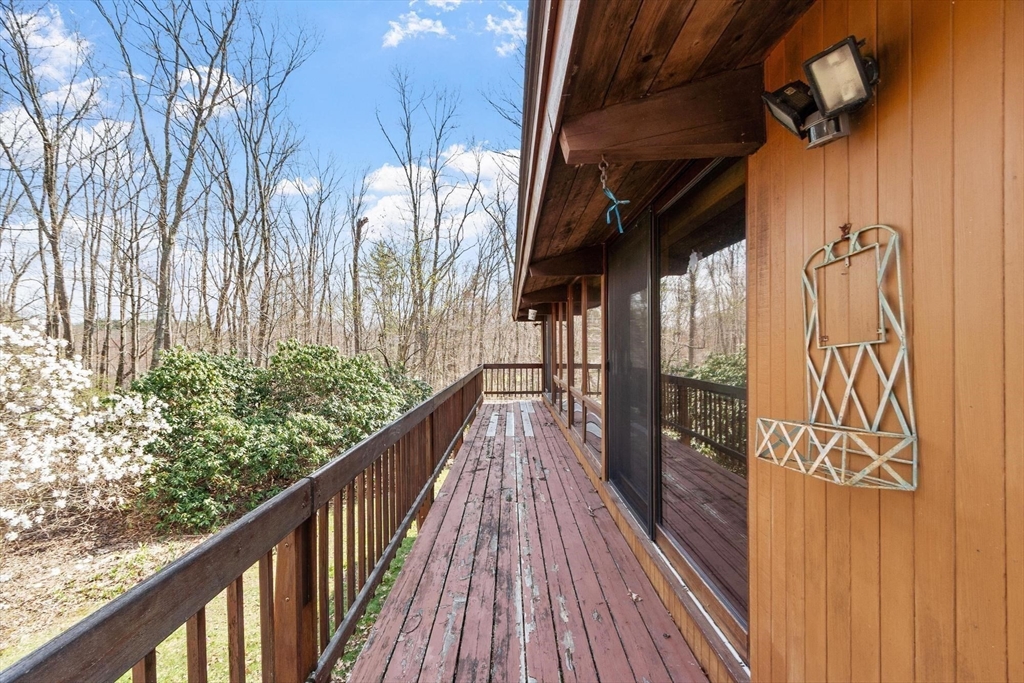 21 Gray Road Andover, MA 01810 - Photo 30 of 38 a view of balcony with wooden floor