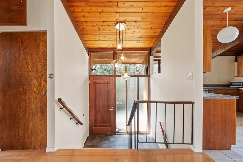 21 Gray Road Andover, MA 01810 - Photo 5 of 38 a view of staircase with railing and white walls