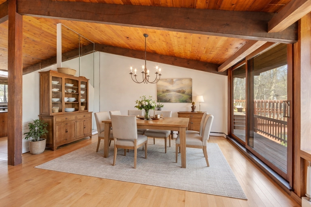 21 Gray Road Andover, MA 01810 - Photo 7 of 38 a dining room with furniture window and wooden floor