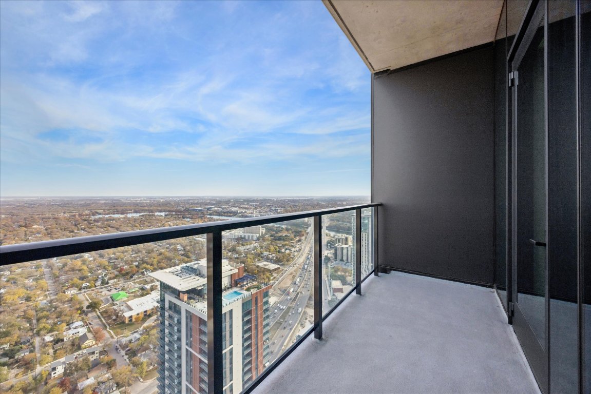 610 Davis Street, Unit 5007 Austin, TX 78701 - Photo 11 of 33 Balcony off of Bonus Room with an east view.