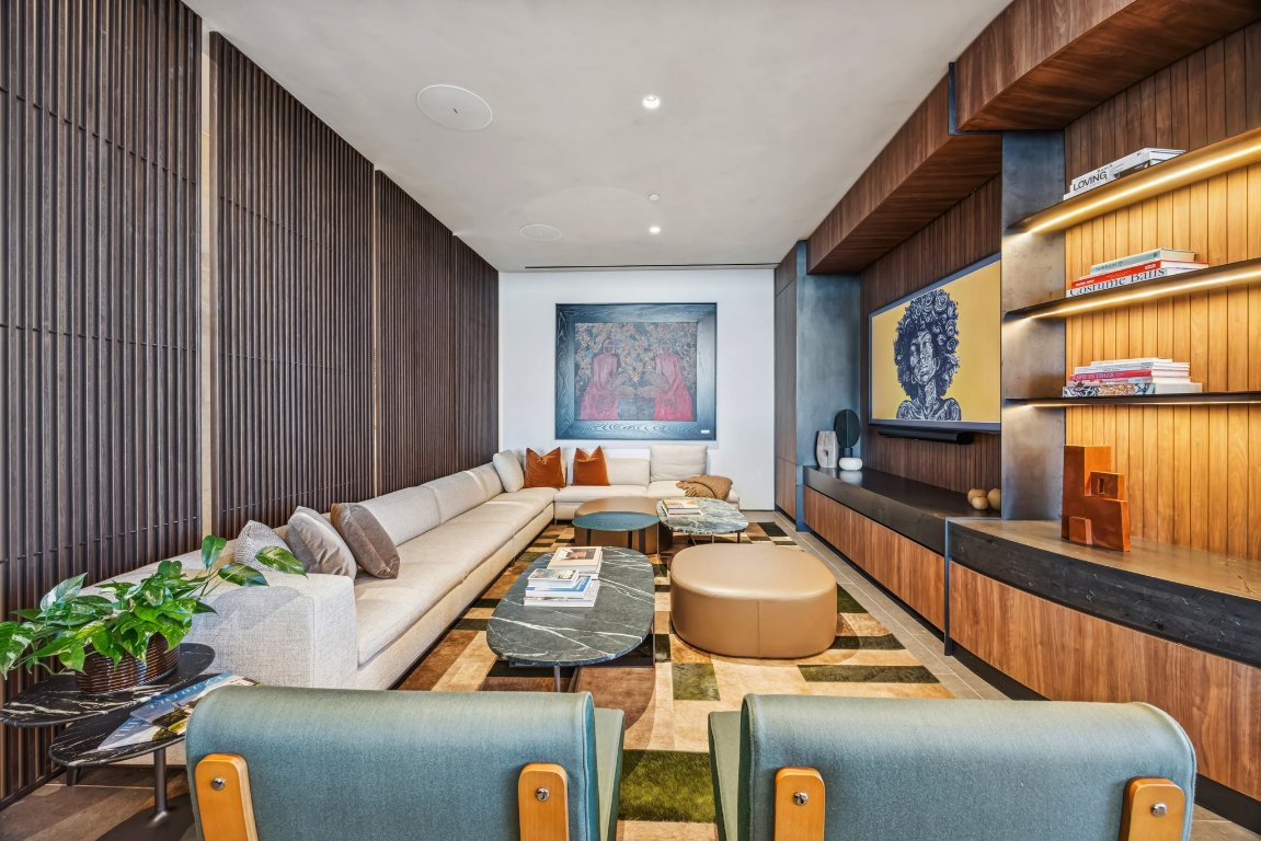 610 Davis Street, Unit 5007 Austin, TX 78701 - Photo 20 of 33 Amenity area with wooden walls