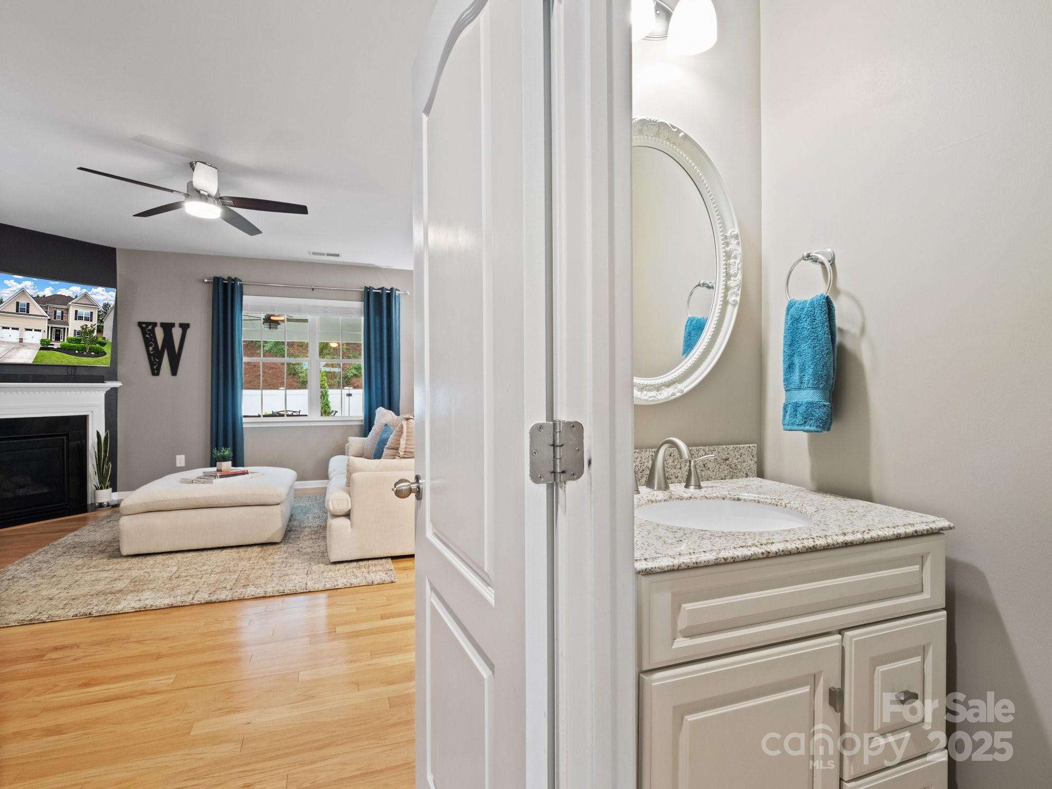 1033 Crawford Drive Lancaster, SC 29720 - Photo 11 of 48 a en suite bathroom with a granite countertop tub and a mirror