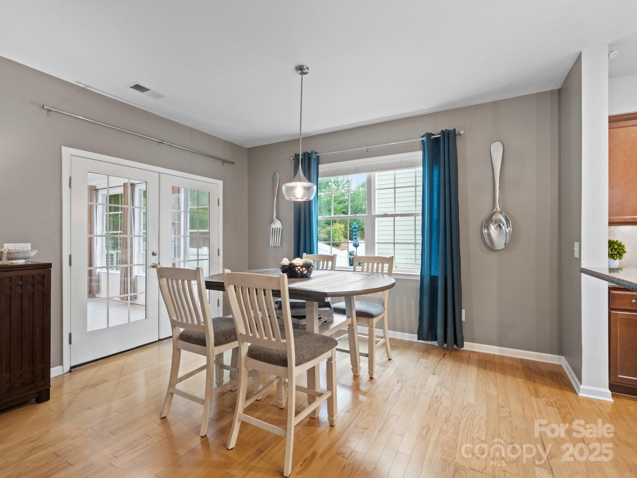 1033 Crawford Drive Lancaster, SC 29720 - Photo 20 of 48 a view of a dining room with furniture window and wooden floor