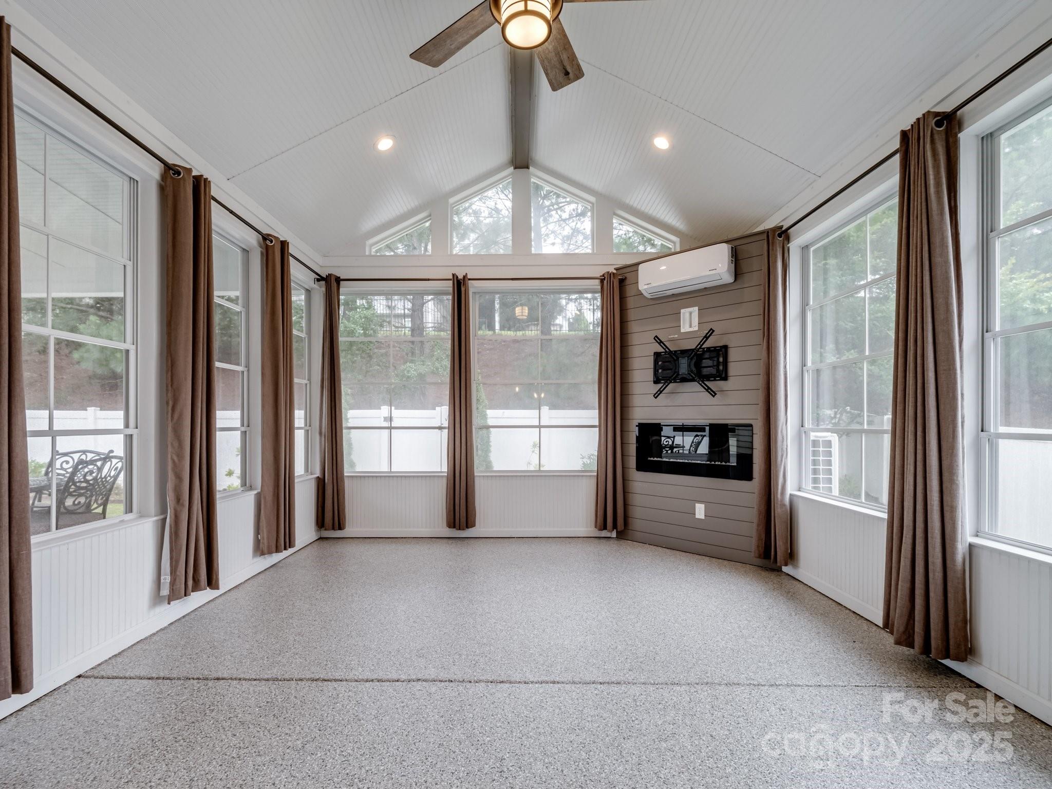 1033 Crawford Drive Lancaster, SC 29720 - Photo 3 of 48 a view of an empty room with a window and a kitchen
