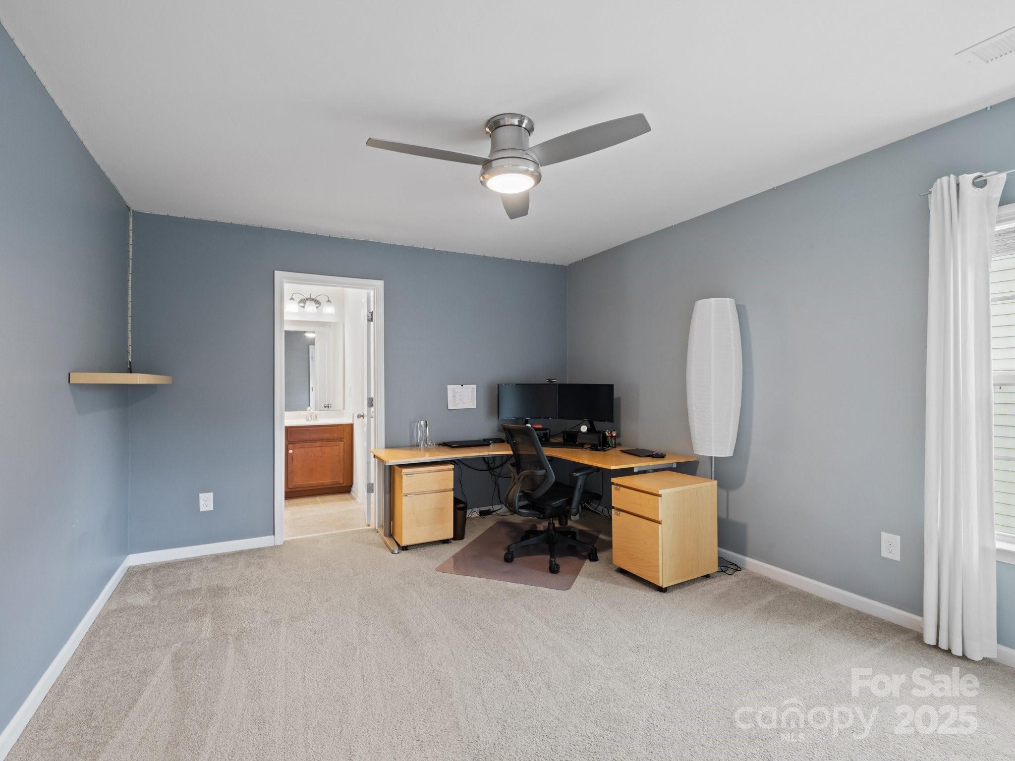 1033 Crawford Drive Lancaster, SC 29720 - Photo 33 of 48 a view of a workspace with furniture and a window
