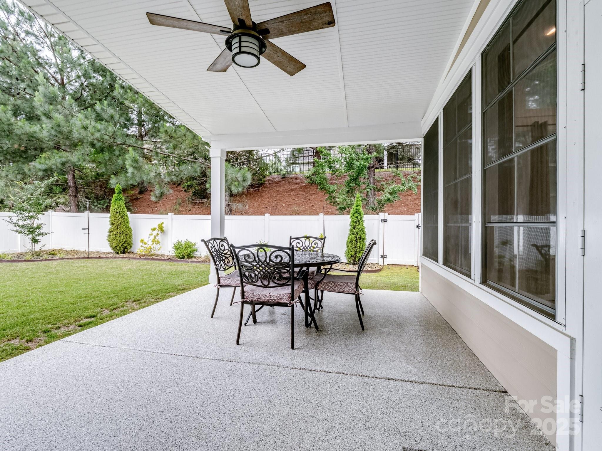 1033 Crawford Drive Lancaster, SC 29720 - Photo 40 of 48 a view of a patio with a table chairs and a yard