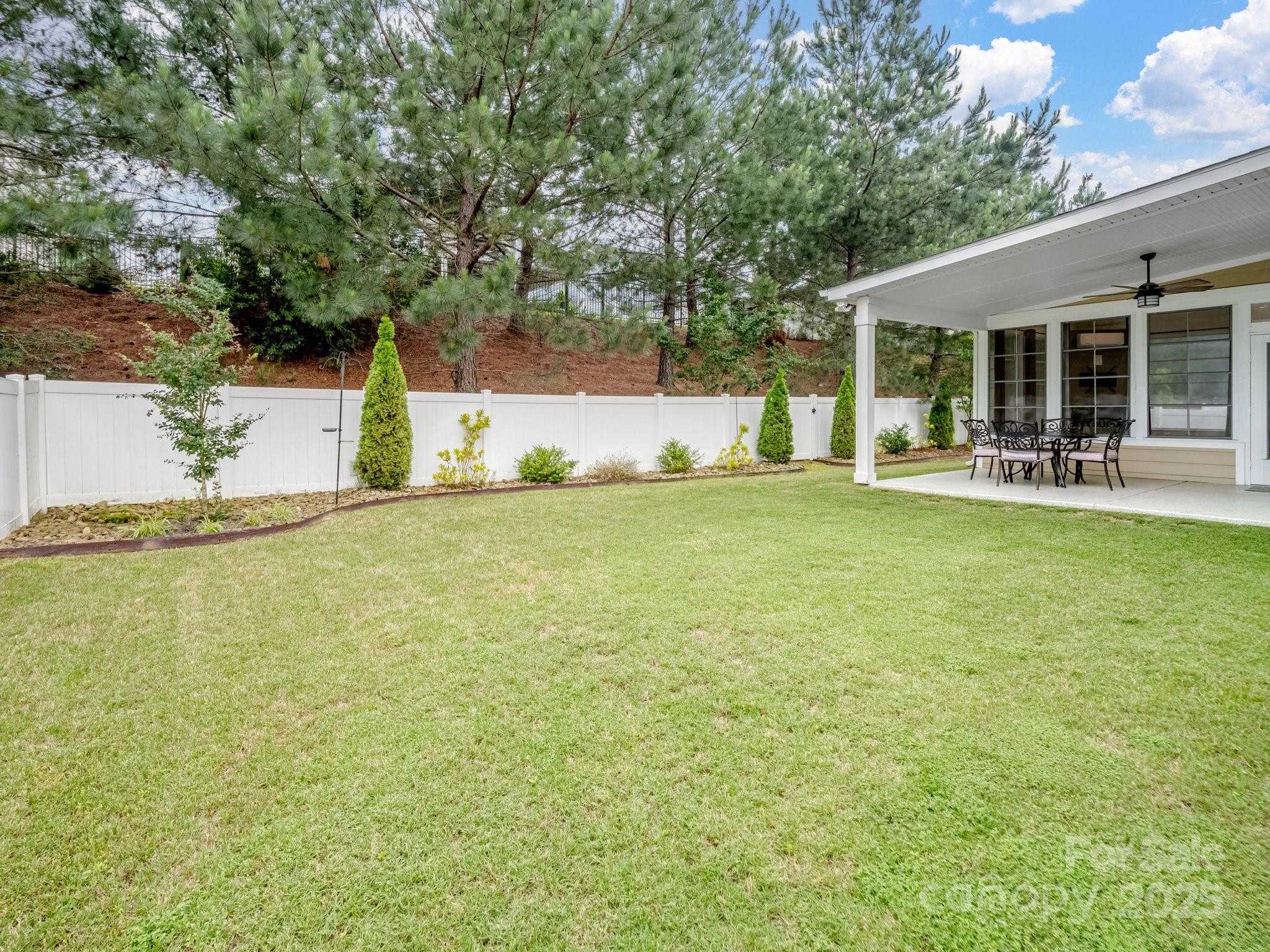 1033 Crawford Drive Lancaster, SC 29720 - Photo 43 of 48 a view of a house with backyard and sitting area
