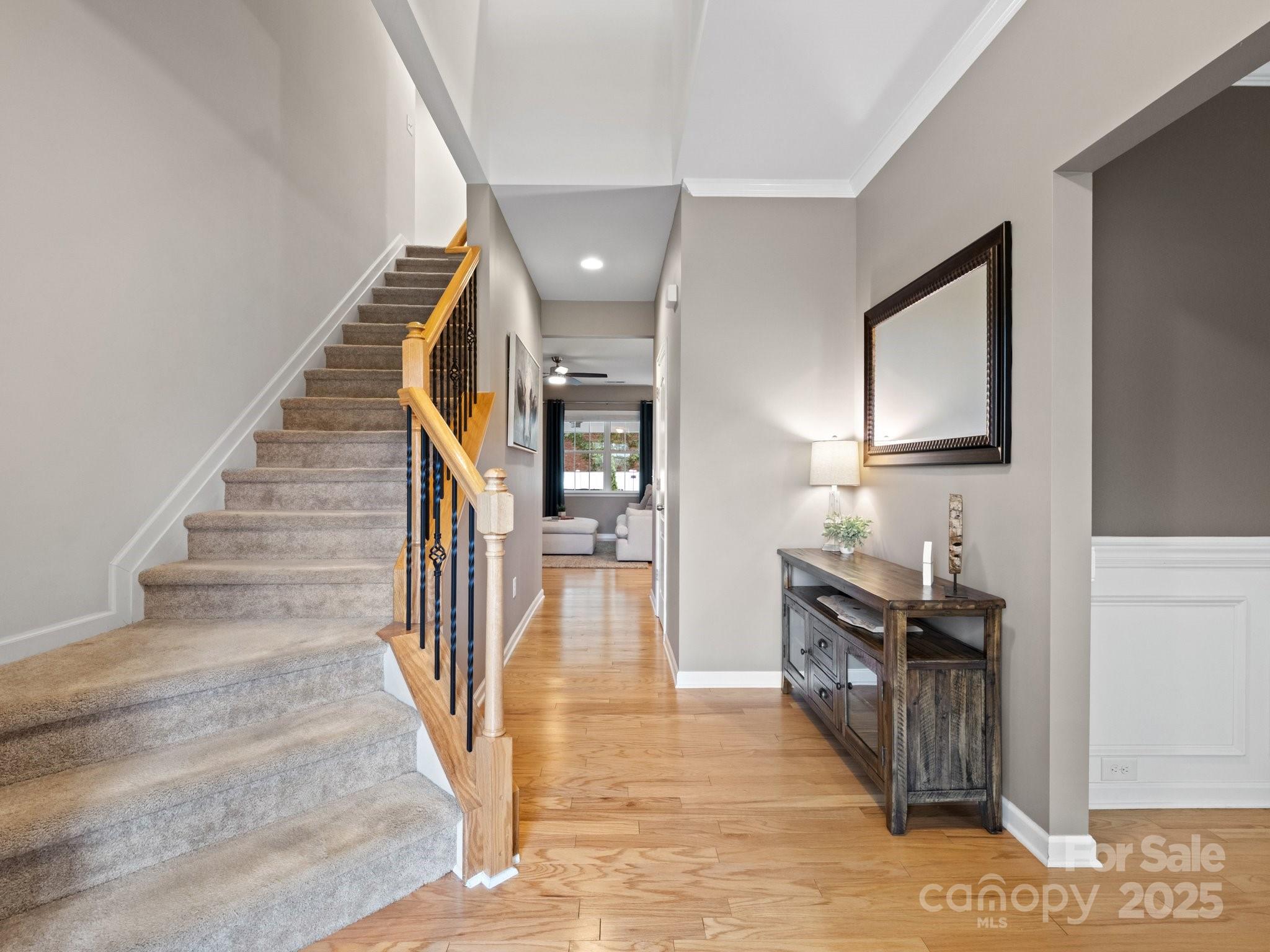 1033 Crawford Drive Lancaster, SC 29720 - Photo 8 of 48 a view of a hallway with wooden floor and staircase