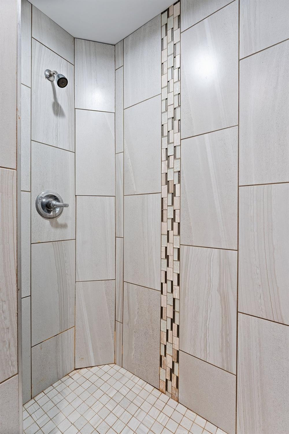 10983 Potomac Drive Demotte, IN 46310 - Photo 15 of 18 a bathroom with a shower