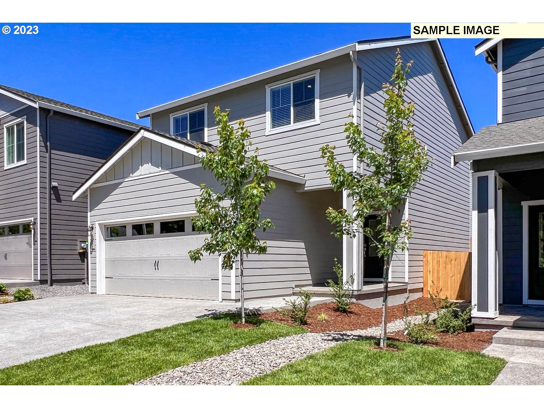 3974 Southwest Knapp Drive Gresham, OR 97080 - Photo 7 of 14 a front view of a house with a yard