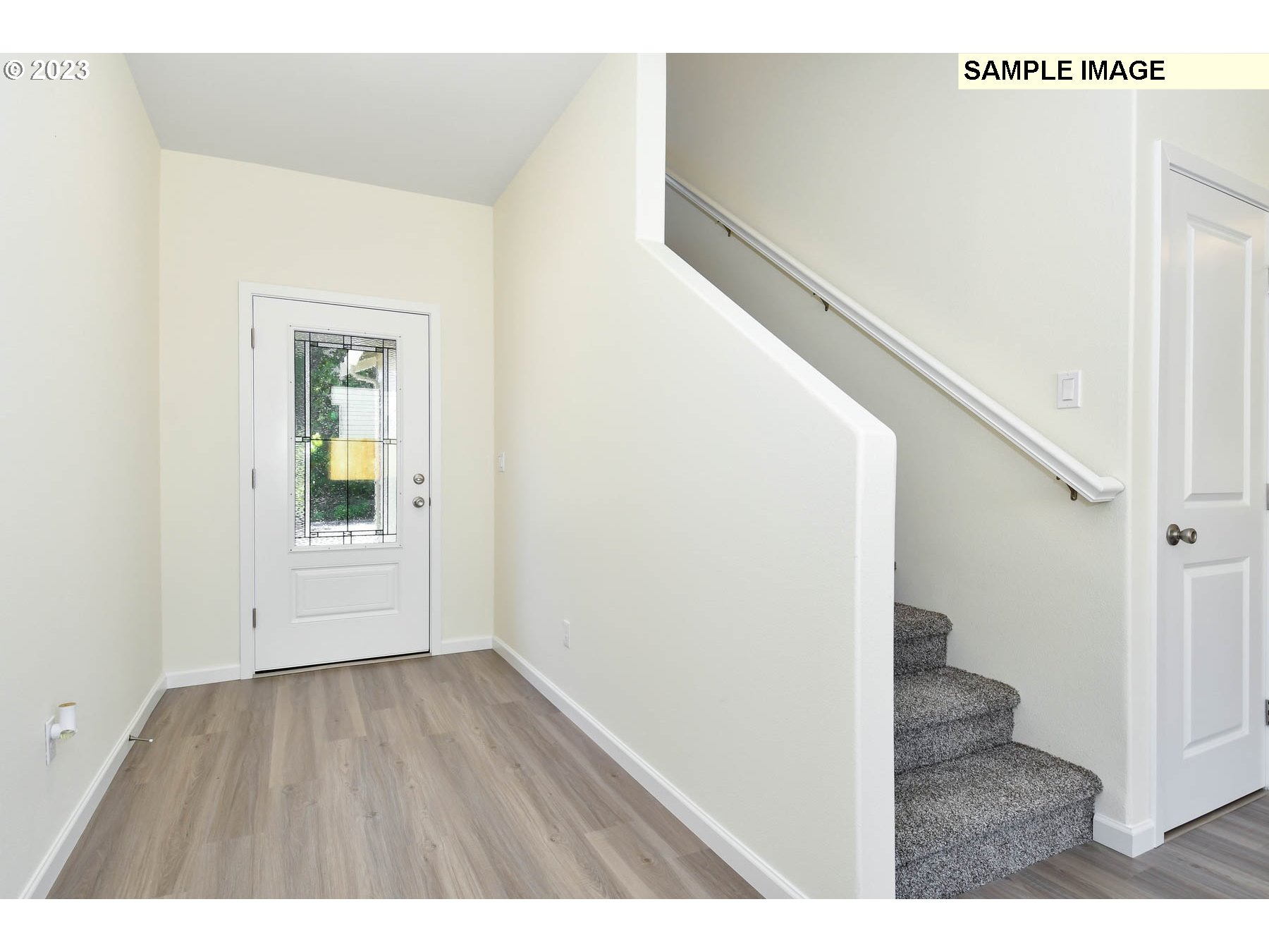 3974 Southwest Knapp Drive Gresham, OR 97080 - Photo 8 of 14 a view of an empty room with wooden floor