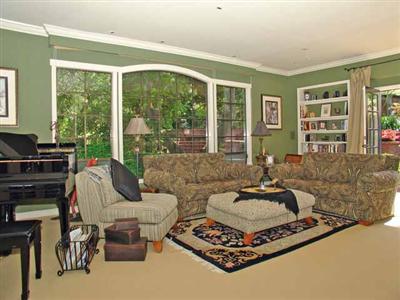 146 Crest Road Novato, CA 94945 - Photo 3 of 6 a living room with furniture and large windows
