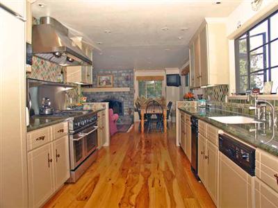 146 Crest Road Novato, CA 94945 - Photo 5 of 6 a large kitchen with stainless steel appliances granite countertop lots of counter top space and a sink