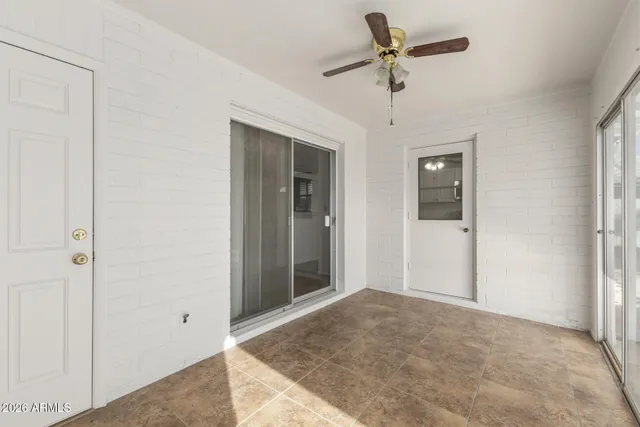 a bathroom with a sink a bath tub and a window