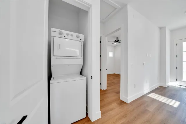 a view of bathroom with a tub and shower