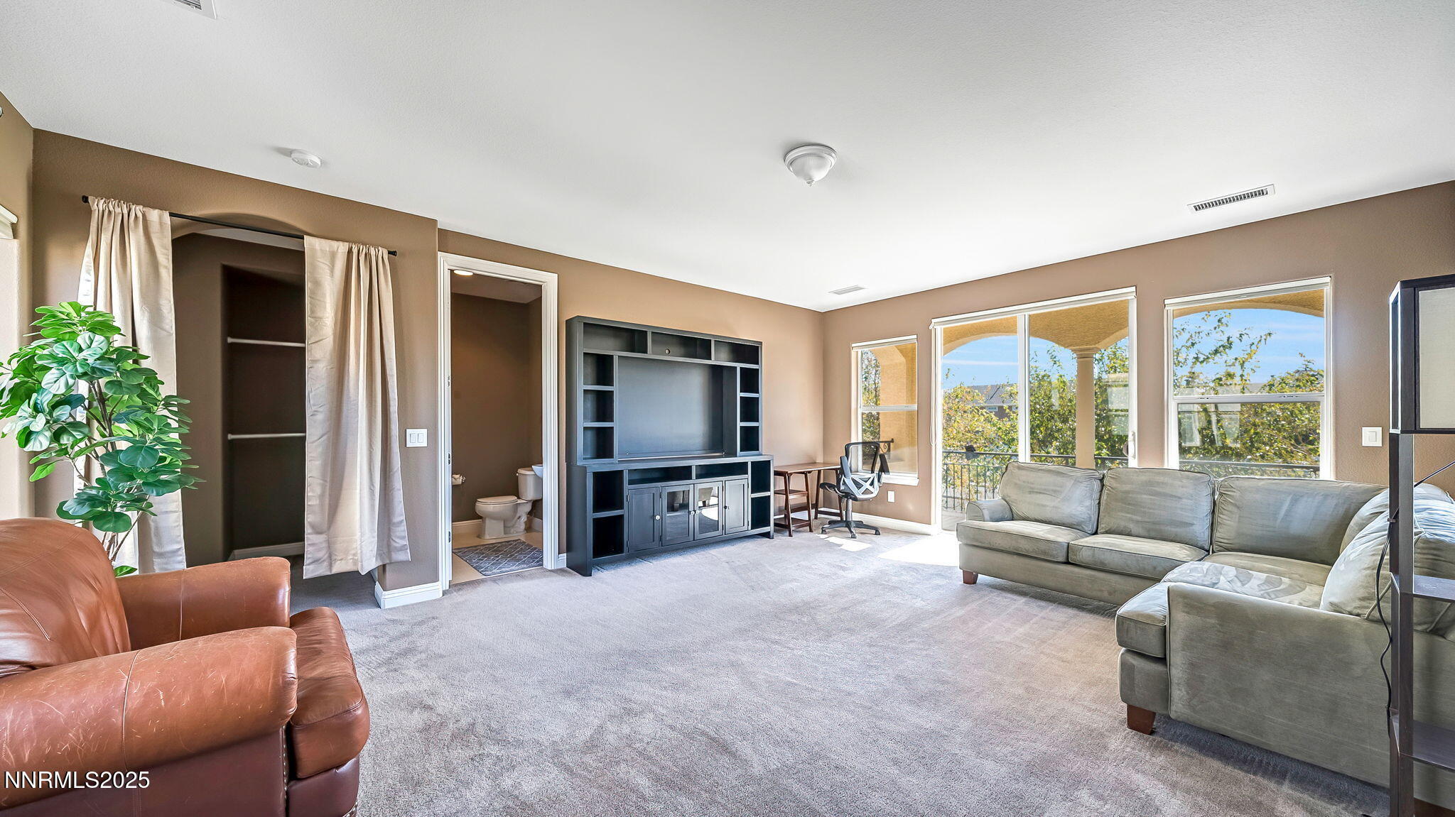 1812 Braemore Drive Reno, NV 89521 - Photo 21 of 26 a living room with furniture and large windows