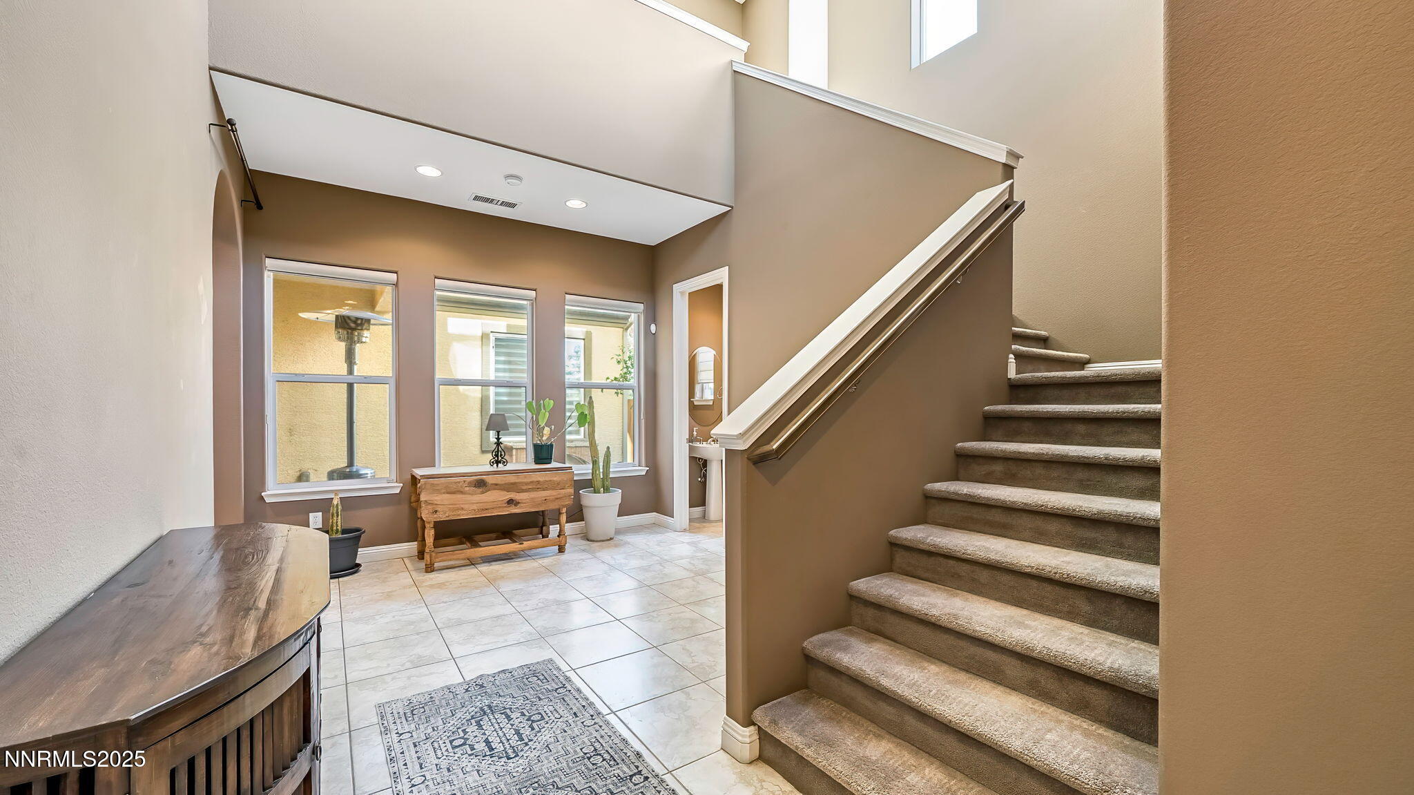 1812 Braemore Drive Reno, NV 89521 - Photo 3 of 26 a living room with furniture and a large window