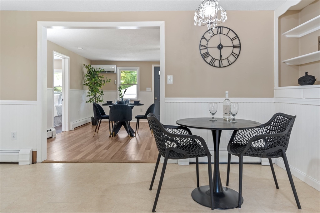 74 County Road East Freetown, MA 02717 - Photo 11 of 40 a view of a dining room with furniture window and wooden floor
