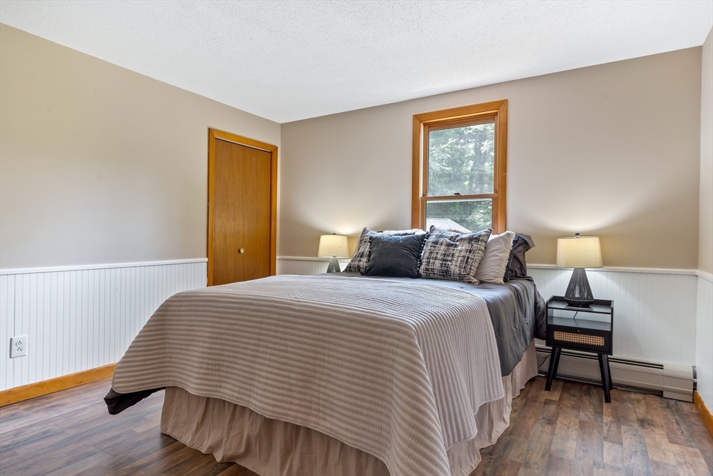 74 County Road East Freetown, MA 02717 - Photo 19 of 40 a bedroom with a bed and a window