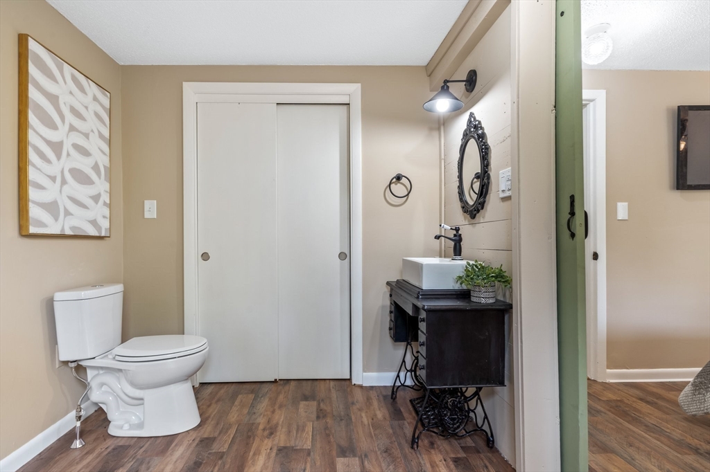74 County Road East Freetown, MA 02717 - Photo 20 of 40 a bathroom with a toilet and a mirror
